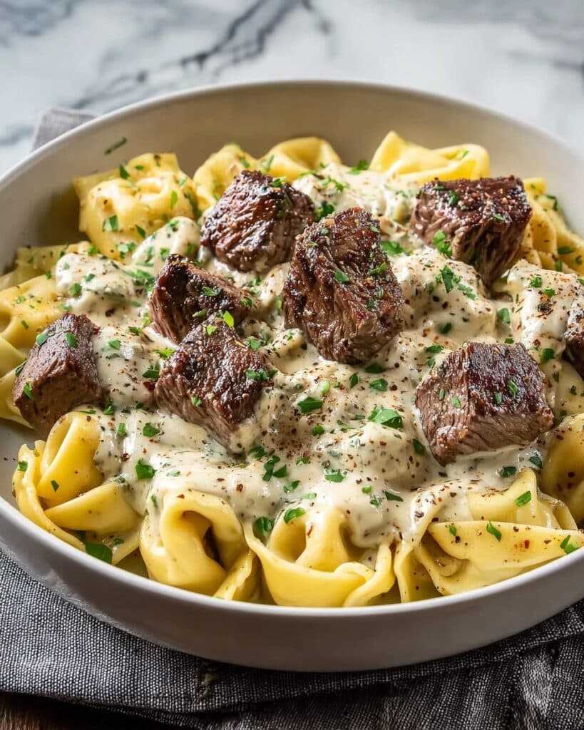 Garlic Steak Tortellini in Creamy House Sauce Bliss Recipe